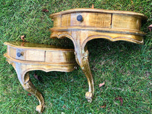 Load image into Gallery viewer, A pair of antique gold leaf French wall-mounted console tables