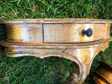 Load image into Gallery viewer, A pair of antique gold leaf French wall-mounted console tables